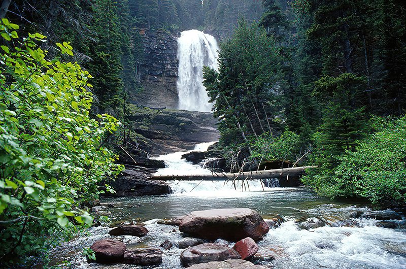 Glacier stream with waterfall